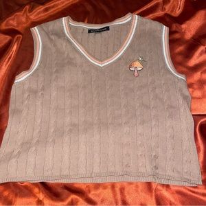 Brown sweater vest